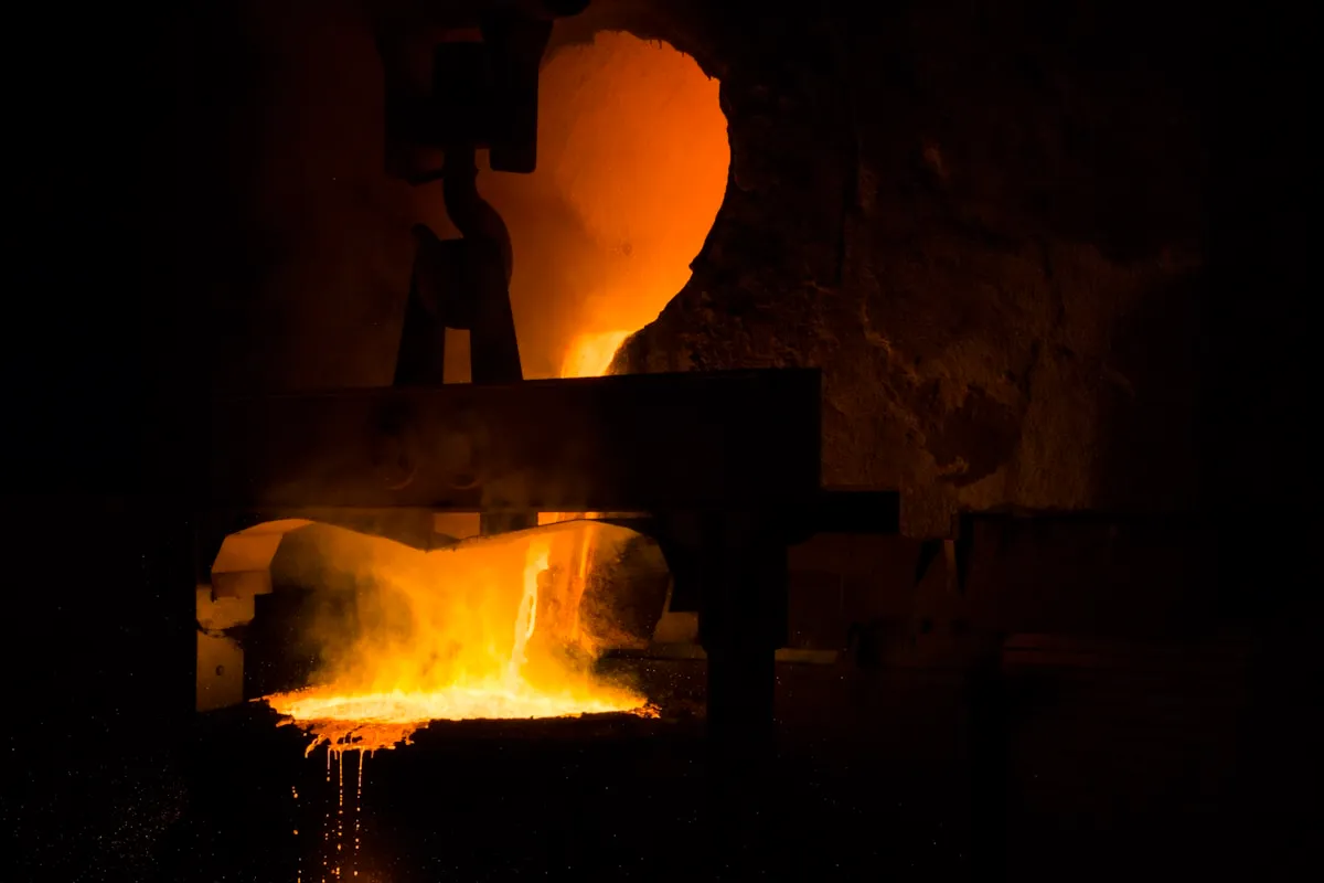 Technician servicing a residential gas furnace